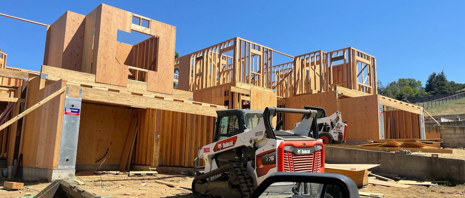Residential construction site with equipment and soil